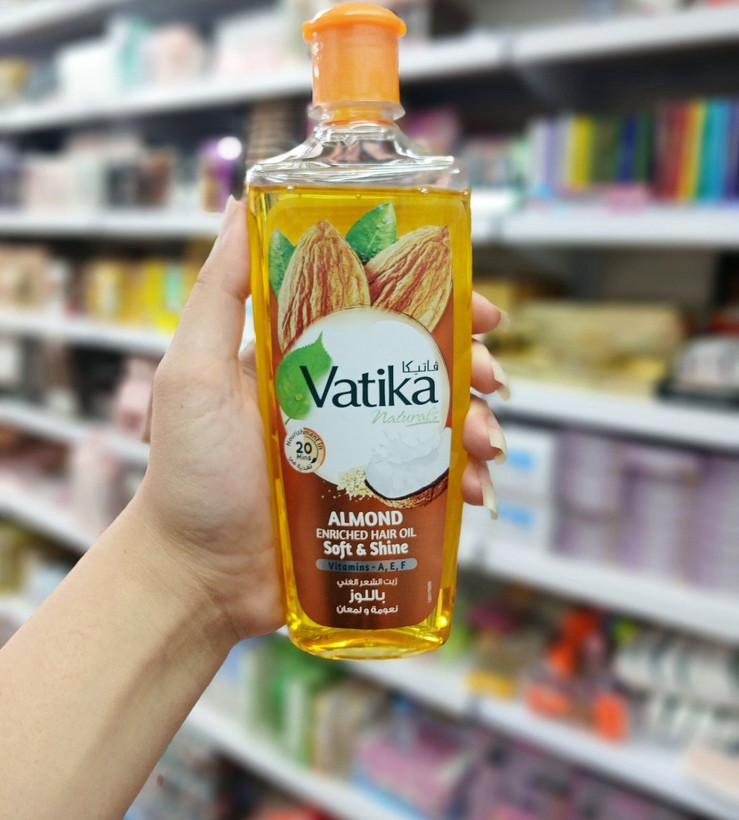 روغن موی نرم کننده و درخشان کننده بادام واتیکا Vatika Almond Soft Shine حجم 200 میلی لیتر